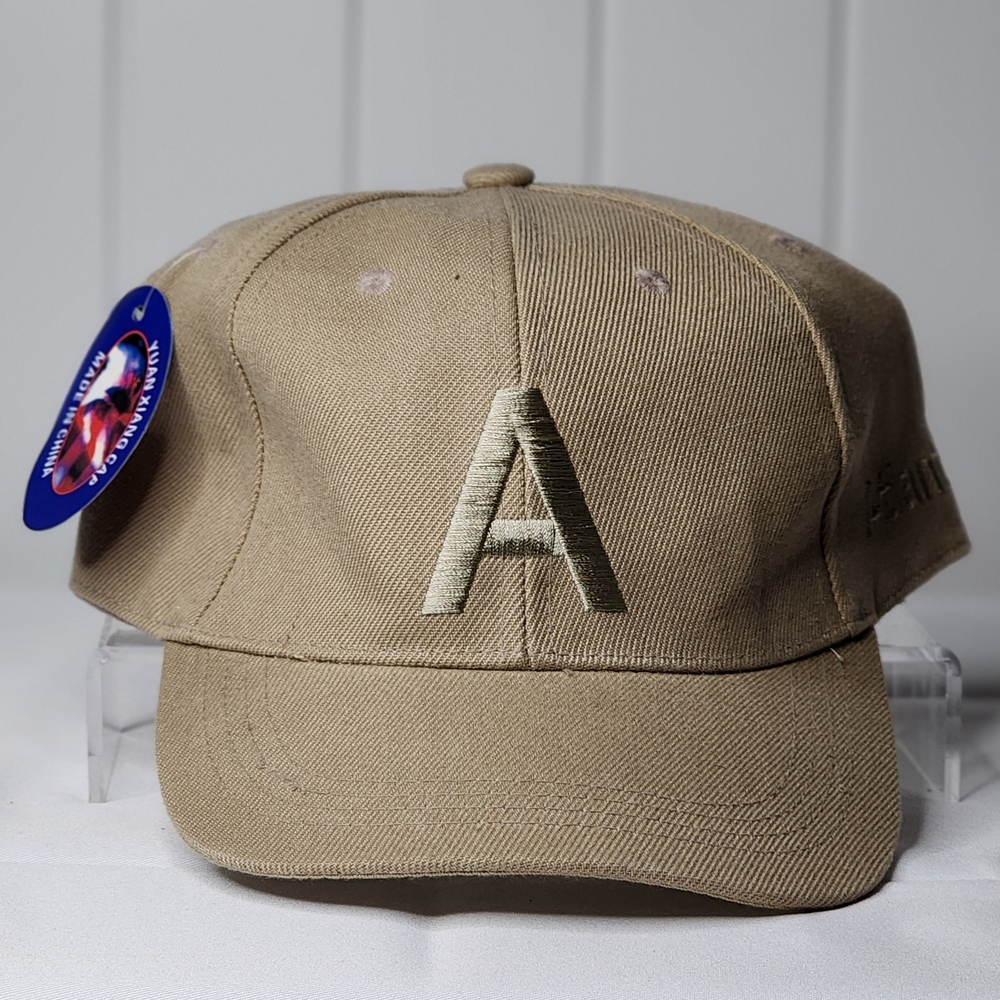 A Initial Tan Cap